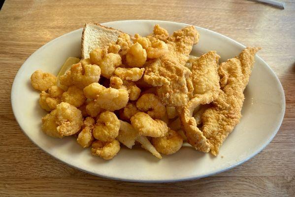 Fried shrimp and catfish with French fries at Orlando's.