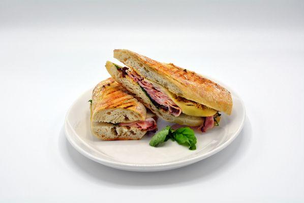 Roasted Porchetta: French Bread, Roast Pork, Asiago Cheese, Provolone, Arugula, Grain Mustard, 
 Balsamic Caramelized Onions