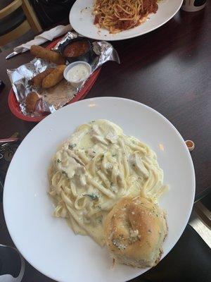 Fettuccine chicken Alfredo and homemade spaghetti