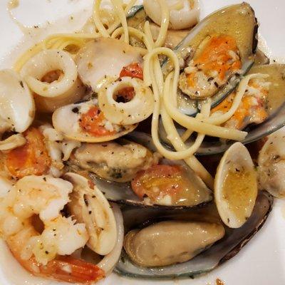 Frutti di Mare, seafood in brandy sauce over linguini.  Delicious