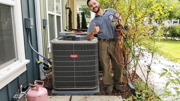 Working on Bryant air conditioner.