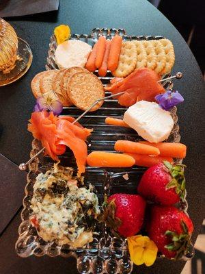 Choose-your-own-adventure snack place! We picked strawberries, carrots, lox, crackers, goat cheese, and artichoke dip.