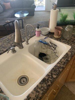 This is exactly how I left the sink... there's basically no dishes and it would have taken minutes to wash these and set them out to dry.