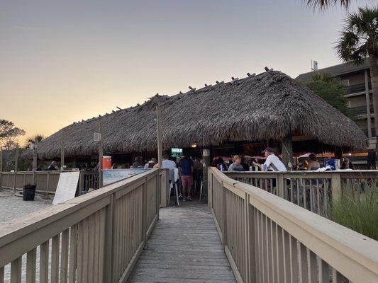 Tiki bar with access to the beach