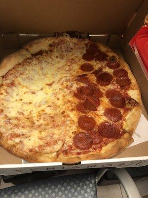 Half extra cheese and less than half pepperoni