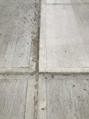 How do you splash cement all over the sidewalk?