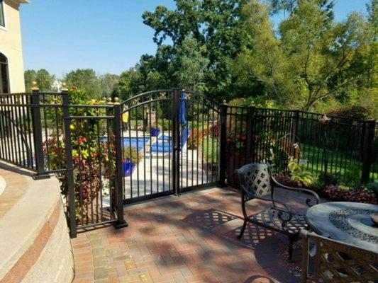 R&T Fence just installed this 5' high Aluminum fence with arched double walkway gate.Check out the gold ball caps and decorative scrolls!