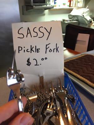 Sassy Pickle Forks for sale at the counter.