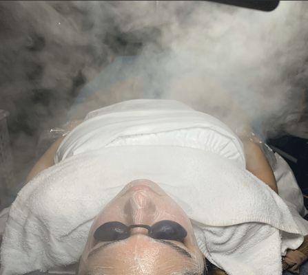 Steaming to soften the skin and preparing for extractions.