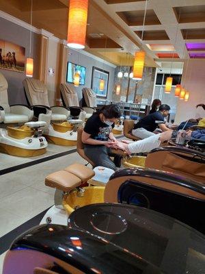 Pedicure area w super comfy seats that give great massages