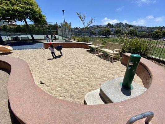 Small sand pit, complete with a [non-working] foot washing station!