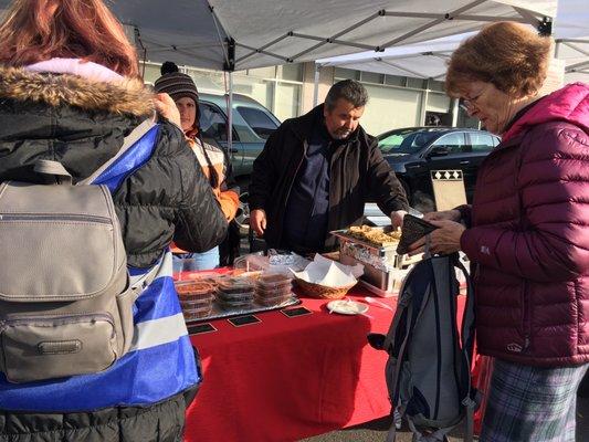 The couple selling warm Börek (phyllo pastry pies) and a few other Mediterranean foods (Nov. 2019)