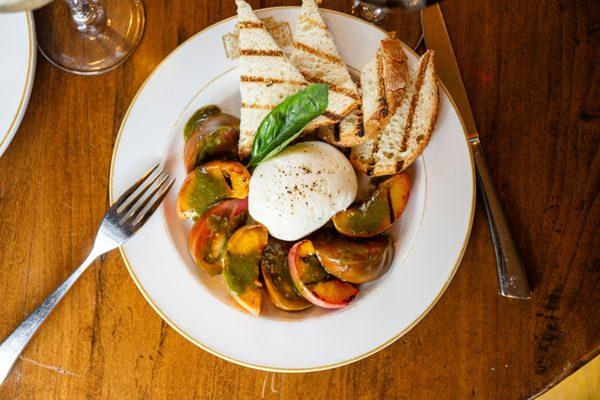 Grilled Peach and Burrata,
burrata cheese, grilled peaches, heirloom tomatoes,
honey basil vinaigrette, charred sourdough