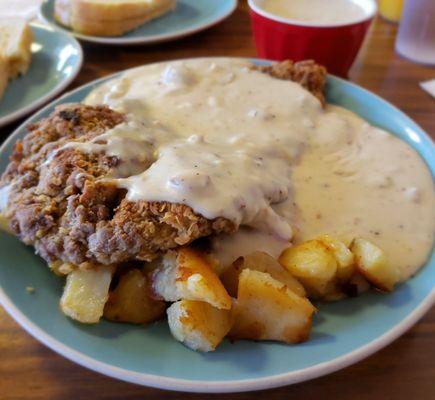 Chicken Fried Steak & eggs with potatoes