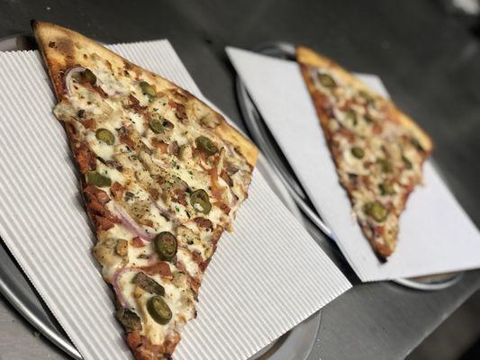 14inch Pizza by the slice $3.99 + .50 cents per topping