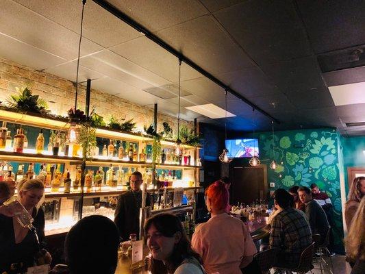 Picture of the bar... it's mostly standing room w a bar w purse hooks along the wall and some bar stools at the bar pictured here.