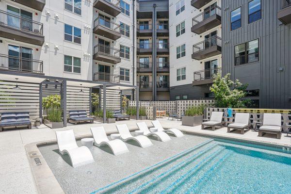 lounge chairs and cabanas at the pool