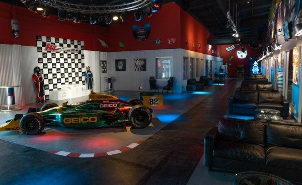 Our lobby includes a podium for social media-worthy photos and even an authentic IndyCar!