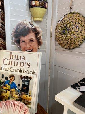 A nice little selection of cookbooks and cookware.