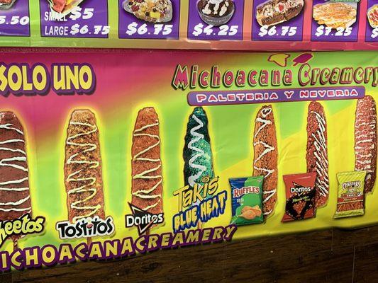 Elote on a stick with your choice of toppings.