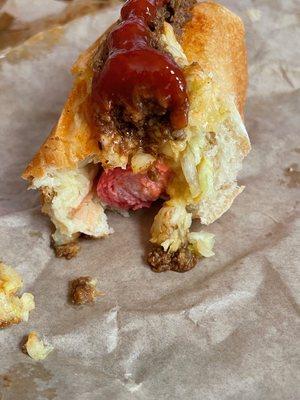 A look at the inside of a chili dog