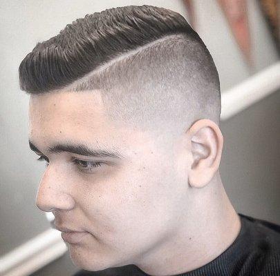 Skin fade with hard part