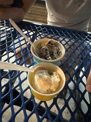 Toasted coconut and cookies and cream yellow cup is one scoop