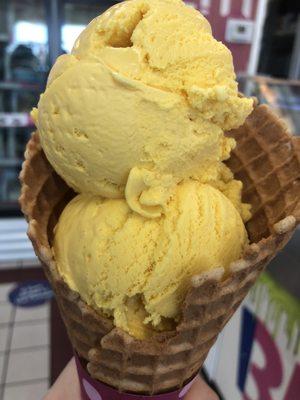 Two scoops of Lemon Custard in a waffle cone!