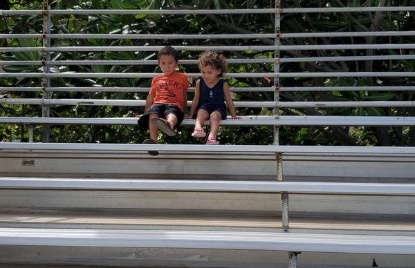 Brother and sister time waiting for the dolphins to show off their stuff!