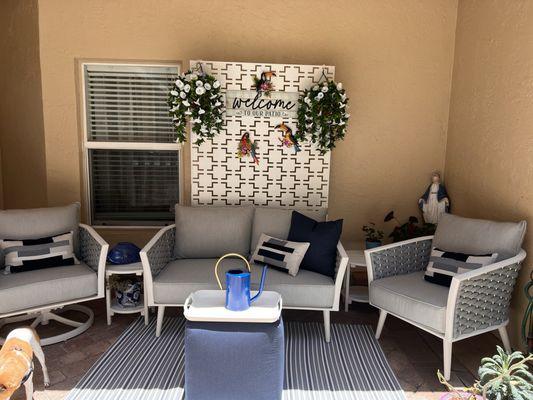 Loveseat , rocker, pouf , and stationary chair. Now have a comfy front patio.