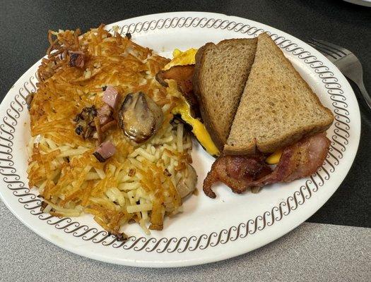 Bacon Egg & Cheese on wheat toast. Hash with onion, mushroom, ham