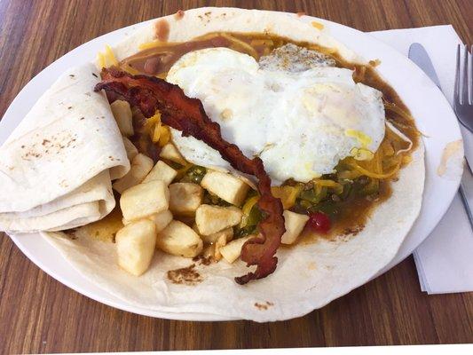 Heuvos rancheros with green chili