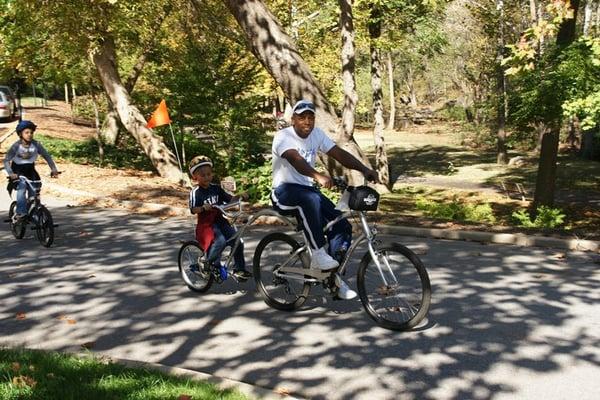 Tag-a-long bike attachment