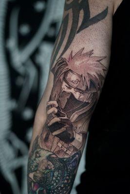 Kakashi Anime tattoo on the elbow. Done by Raul