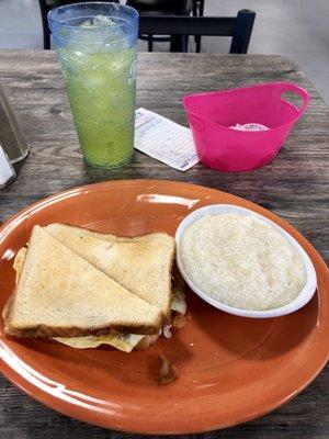 Bacon, egg and cheese with grits