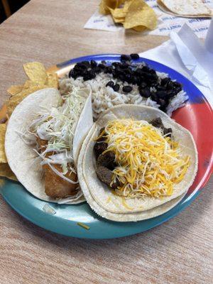 Two taco combo. Surf taco and steak. (Notice the cheese to meat ratio).