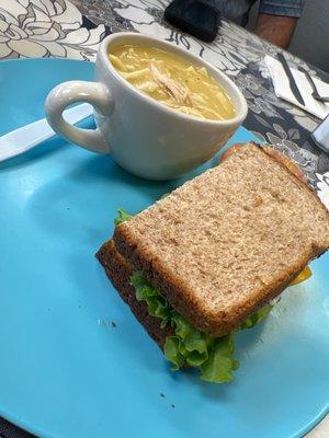 Half Sandwich W/ Small Soup Or Salad Sandwich Grilled Chicken Sandwich and Chicken Noodle Soup