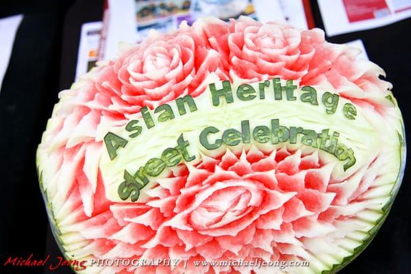 watermelon carved to spell out the event name!