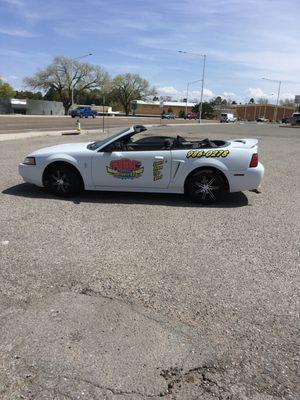 Convertible mustang in front of Losalamos High School