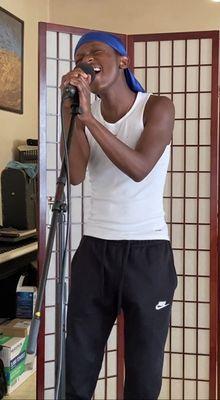 Zaire singing his a off!