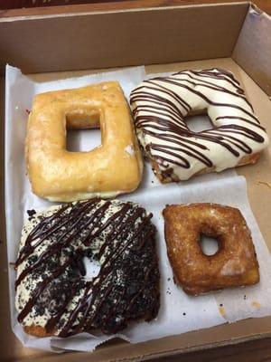 Clockwise from the top left: raspberry jelly, peanut butter and jelly, mini pumpkin, and Oreo peanut butter.