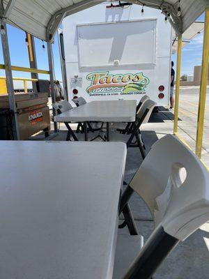 Picnic tables by the food truck