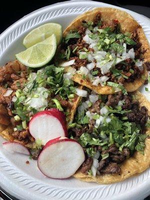 Steak, Mexican sausage and marinated pork tacos