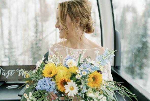 Okay, I love a good winter wedding...  all the guests get to ride up the gondola to get to the ceremony!