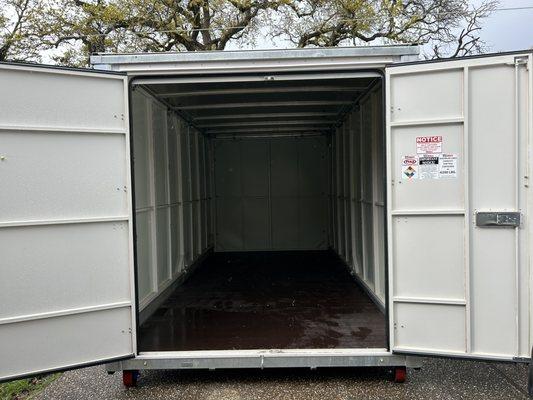 Closer view of the storage container with both doors wide open. (It was raining that day.)