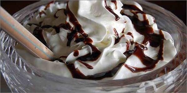 Milkshake with chocolate syrup.