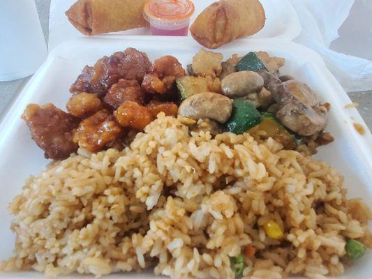 Fried rice and orange chicken and chicken with mushrooms