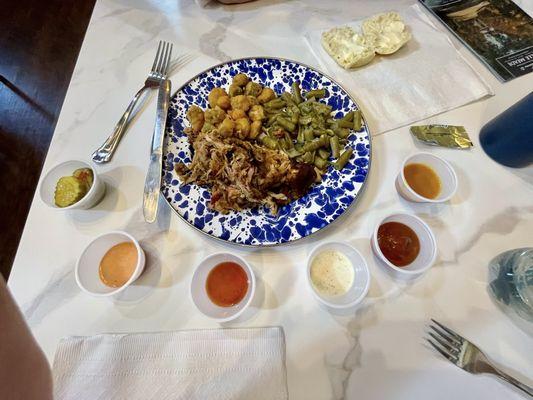 Pulled pork with fried okra and green beans as sides