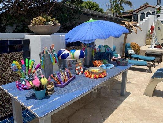 Pool party giveaway table