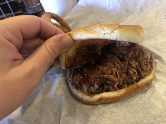 Brisket sandwich and onion rings